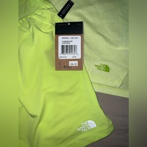 The North Face Neon Running shorts zippered pockets
